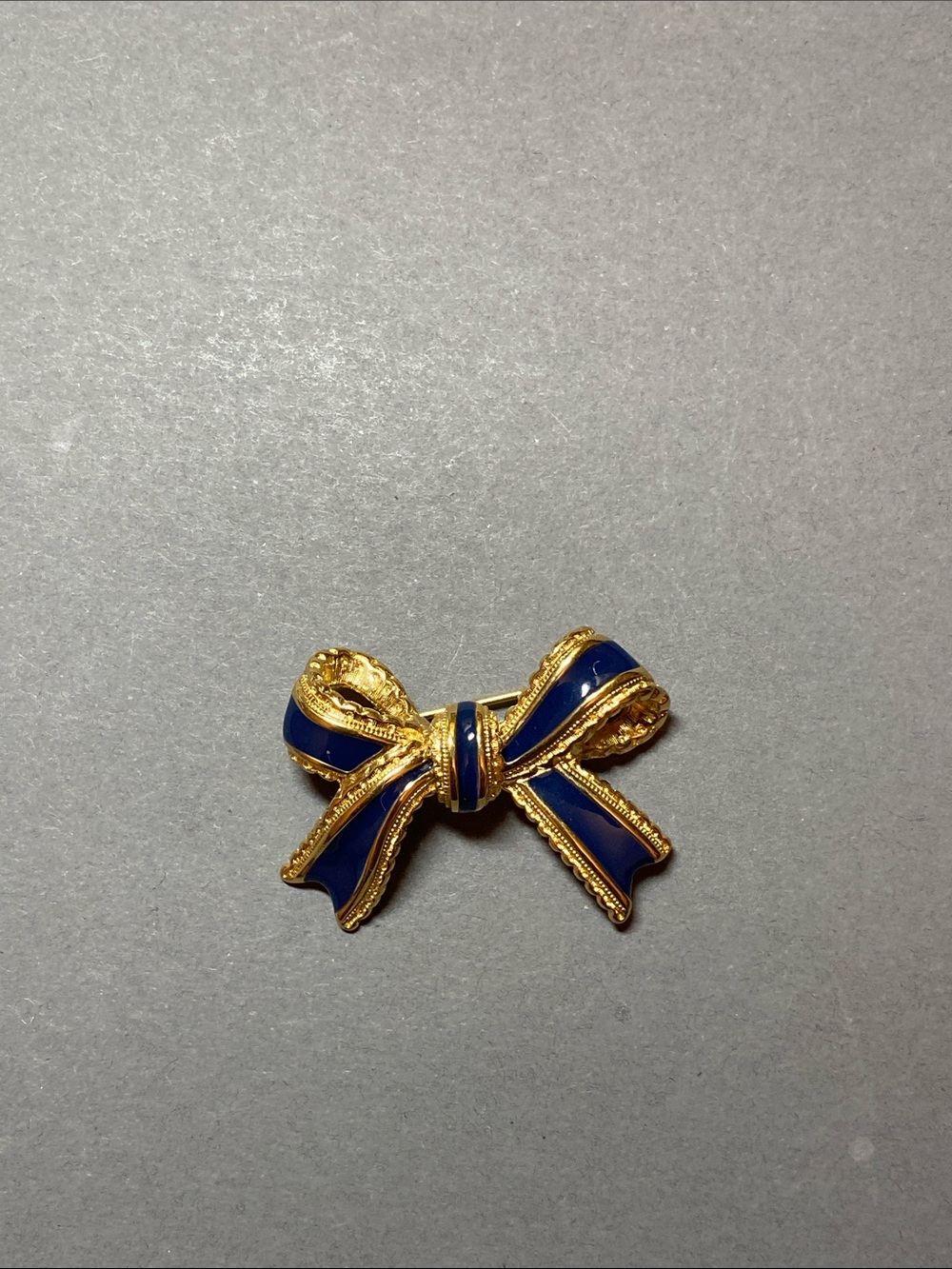 Vintage gold navy enamel bow pin brooch